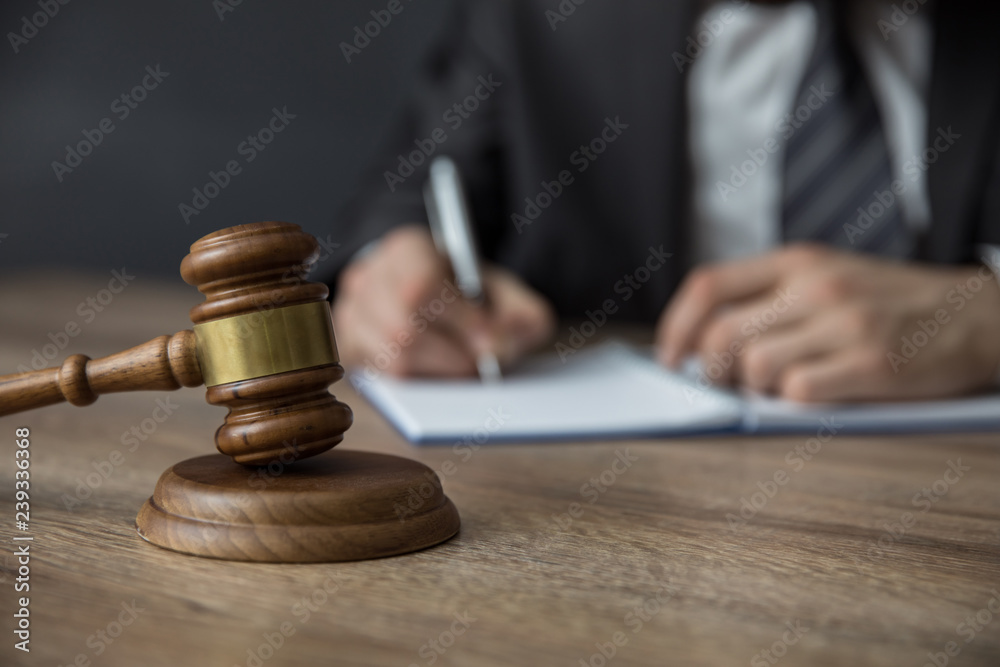 Man with judge on book Man with judge on book