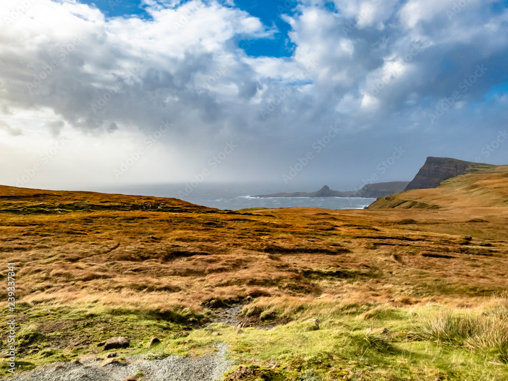 Unusual view of Neist Point with Lighthouse on the Isle of Skye during storm Callum in autumn Unusual view of Neist Point with Lighthouse on the Isle of Skye during storm Callum in autumn