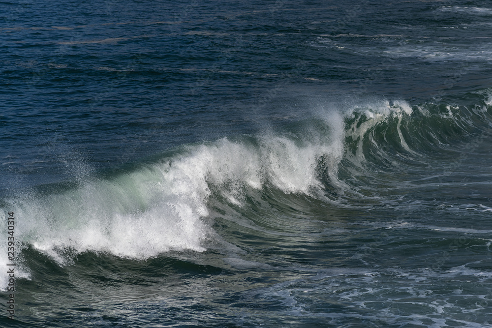 Splashing Atlantic ocean wave.