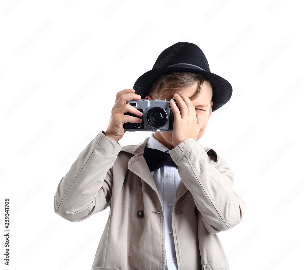 Cute little detective with photo camera on white background Cute little detective with photo camera on white background