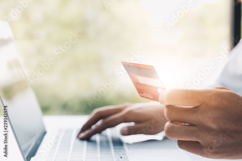 Happy woman doing online shopping with credit card at home, Online Payment Concept.