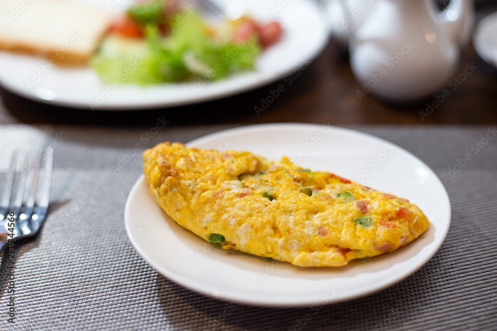 breakfast omelette, scrambled eggs on Table breakfast omelette, scrambled eggs on Table