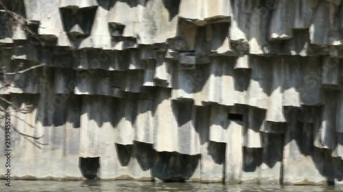 Basalt hexagon ( hexahedron) pool on Golan Heights. Meshushim nature pool in national nature park at north part of Israel photo