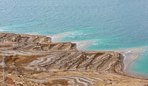 Landscape of the Dead Sea Jordan  beautiful coast failures of the soil and the strong shallowing of the sea illustrating an environmental catastrophe on the Dead Sea  Jordan. Beautiful Dead Sea coast 