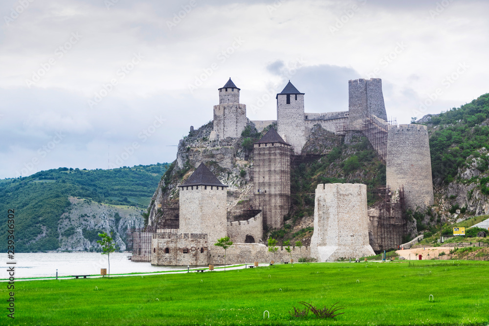 Medieval Golubac fortress on right bank of mighty Danube river. Medieval Golubac fortress on right bank of mighty Danube river.