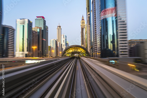 POV on the modern driverless Dubai elevated Rail Metro System, running alongside the Sheikh Zayed Rd, Dubai, UAE photo