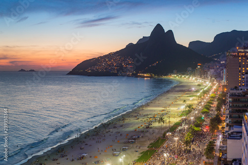 Sunset over Ipanema Beach and Dois Irmaos (Two Brothers) mountain, Rio de Janeiro, Brazil, South America