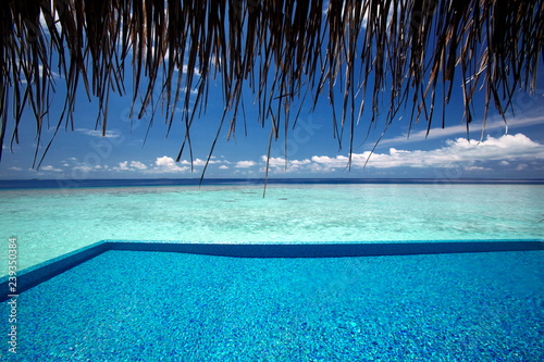 Infinity pool and lagoon, maldives photo