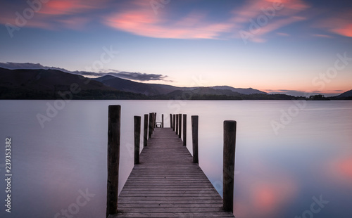 Ferry landing stage on Derwent water at sunset near Ashness Bridge in Borrowdale, in the English Lake District photo