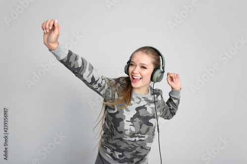 Young female dancer on whit...