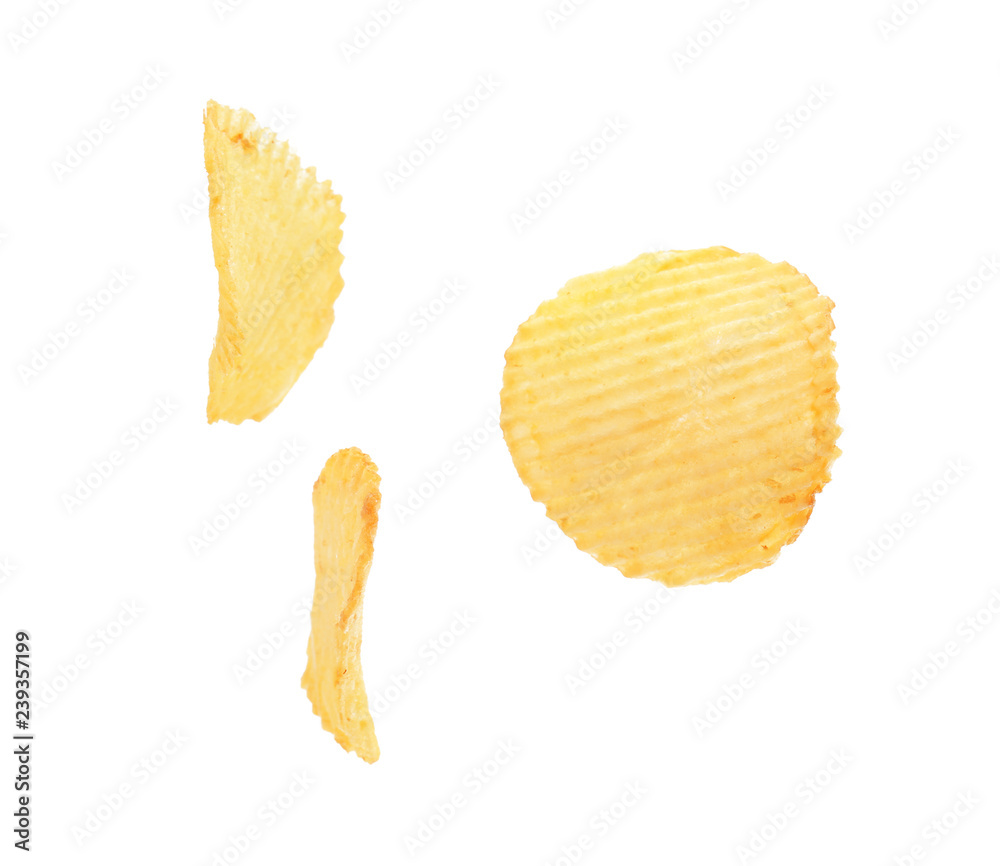 Tasty crispy potato chips on white background Tasty crispy potato chips on white background
