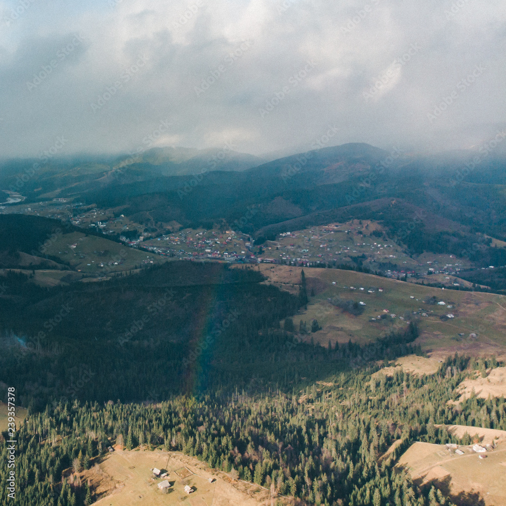 aerial view of carpathian mountains with overcast sky