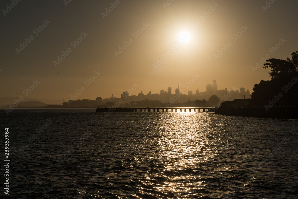 Torpedo Wharf and downtown silhouette at sunrise in San Francisco