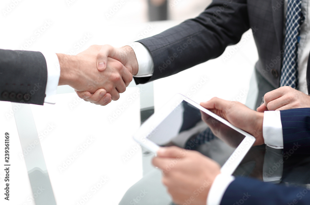 close up.handshake of new business partners