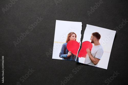Torn photo of happy couple ...