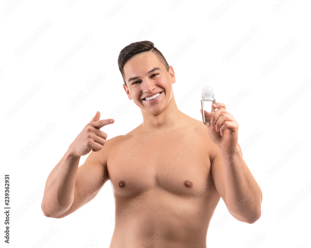Young man with deodorant on white background Young man with deodorant on white background