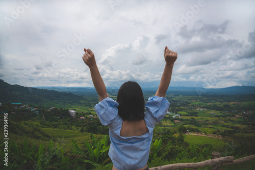 Happy young cute asian Japanese girl hipster backpack women travelling looking at beautiful sky mountains scenery views 