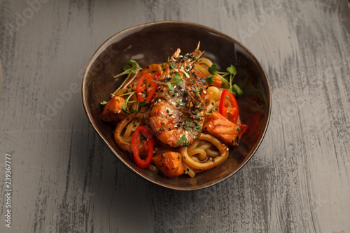 Stir fry with udon noodles, shrimps (prawns) and vegetables. Asian healthy food, meal
