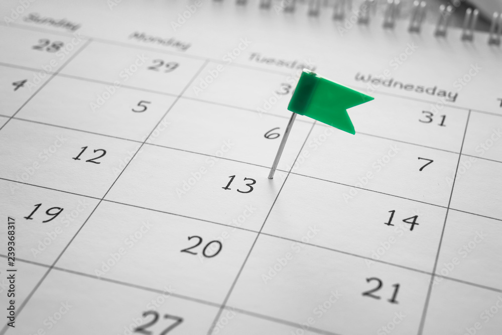 Calendar with pinned date, closeup Calendar with pinned date, closeup