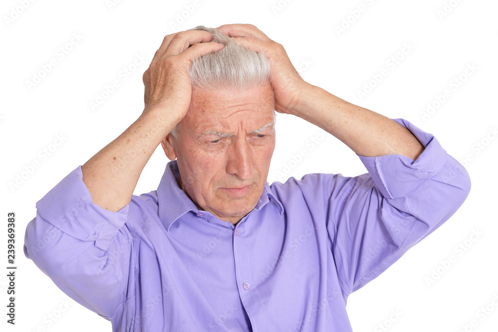 Thinking senior man isolated on white background