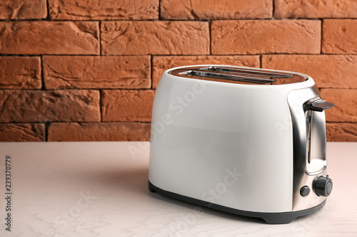 Modern toaster on table