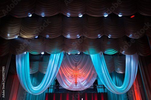 Lighting equipment and scenery in the theater on stage.