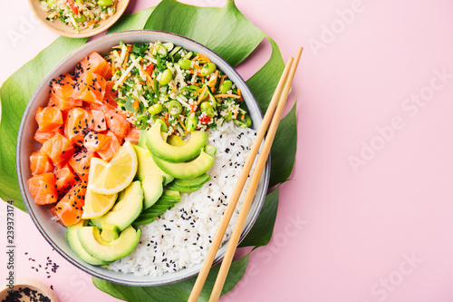 Poke bowl with salmon served in bowl