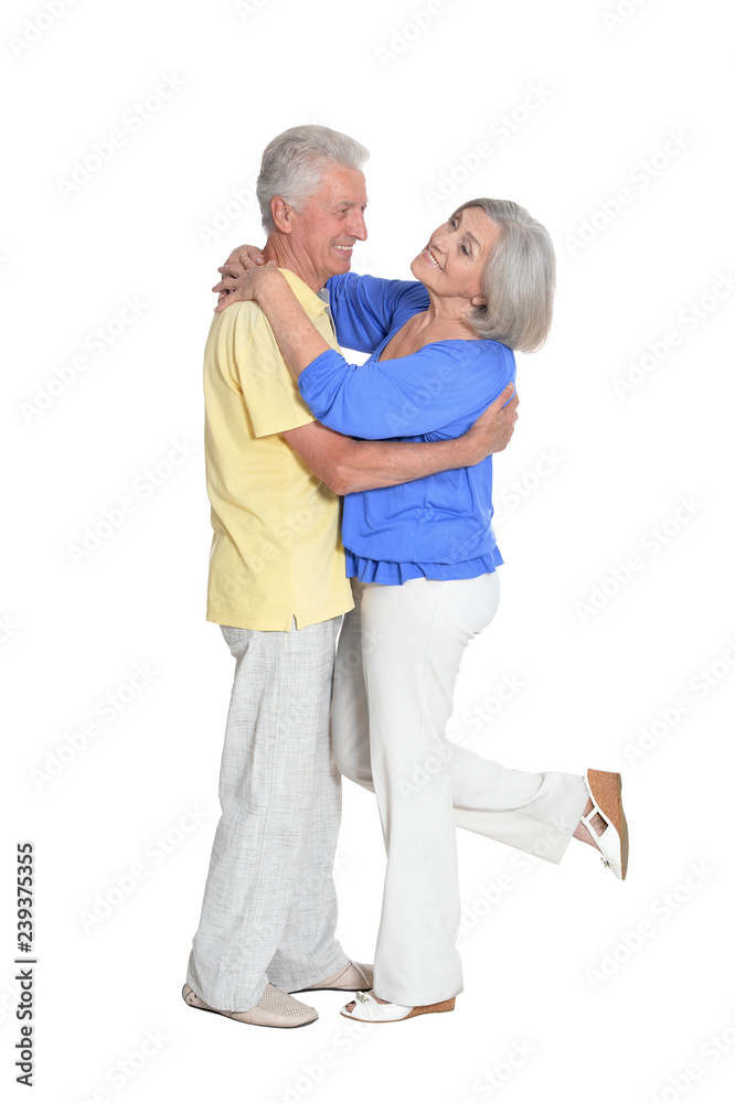 Portrait of senior couple dancing on white background Portrait of senior couple dancing on white background