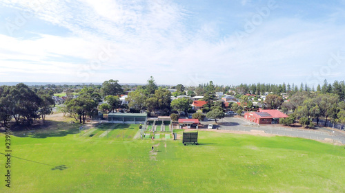 Drone aerial view of Australian public park and sports oval field, taken at Henley Beach.