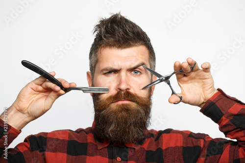 Barber scissors. Mens haircut. Man in barbershop. Bearded man, lush beard,  handsome. Hipster, brutal male. Mens haircut. Vintage barbershop, barber  shop, shaving. Sexy male, macho. Photos | Adobe Stock