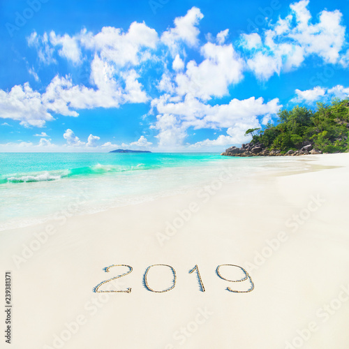 Perfect palm beach Anse Georgette at Praslin island, Seychelles new year starts season 2019