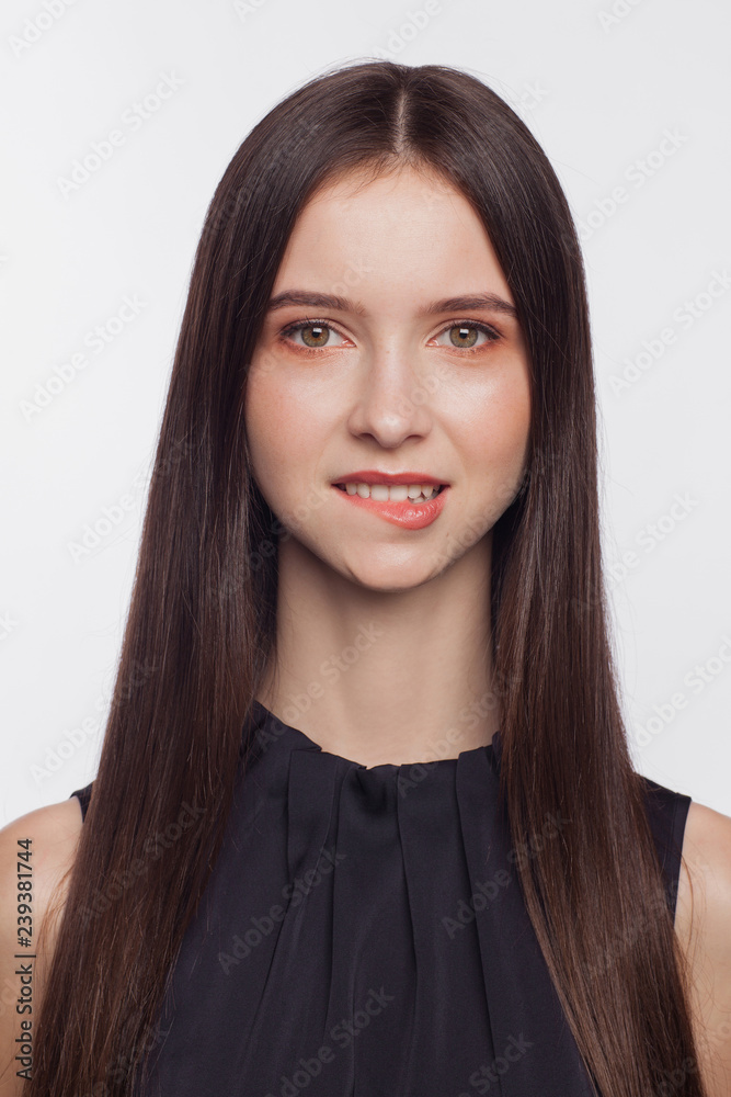 Portrait of a beautiful girl in a black blouse