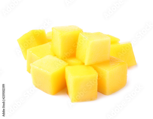 Fresh juicy mango cubes isolated on white