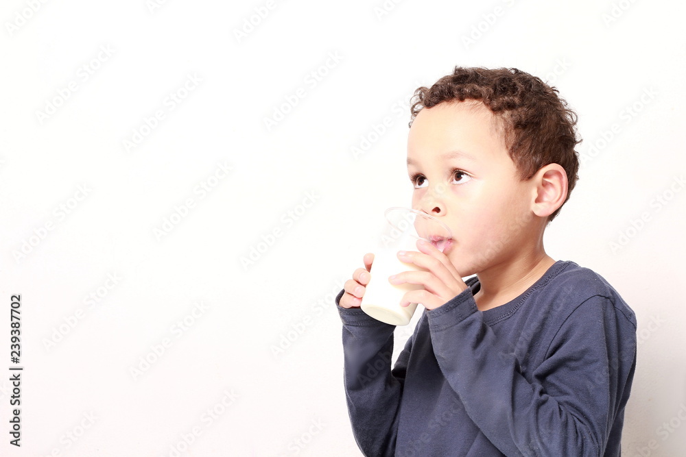 little boy drinking healthy milk for breakfast little boy drinking healthy milk for breakfast