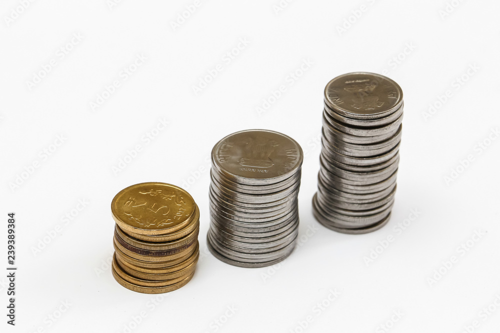 Close up view of indian rupees coins on white background. Close up view of indian rupees coins on white background.