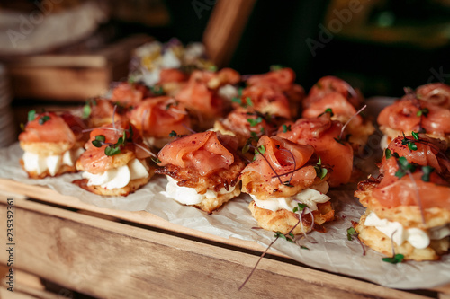 canapes on a wooden tray