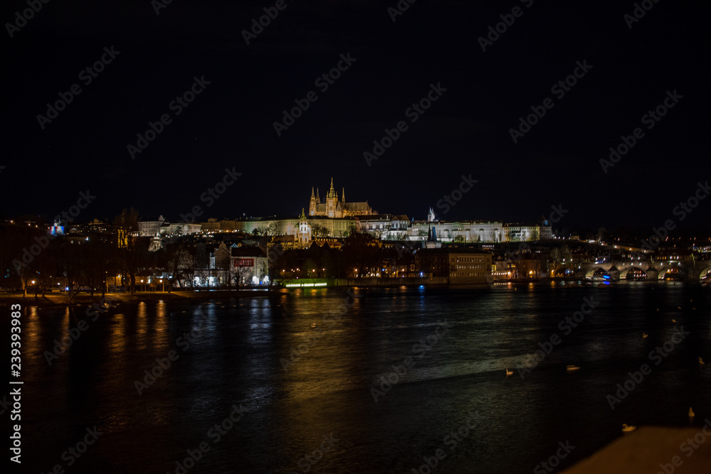 Prague, Czech Republic, Europe,Night panorama overlooking the historic buildings of Prague Castle, Charles Bridge and the Vltava River