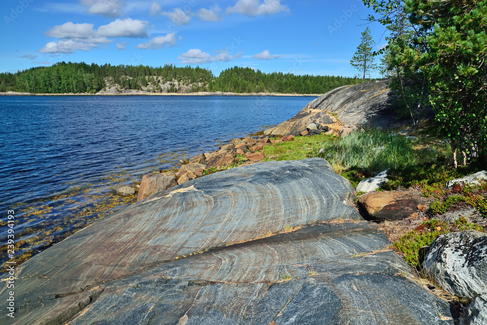 Beautiful rocks on the shore of the White Sea . Bay Chupa, Karelia, Russia
