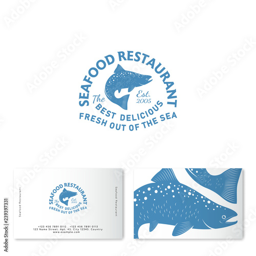 Seafood restaurant logo. Blue Salmon silhouette with lettering. Retro style.