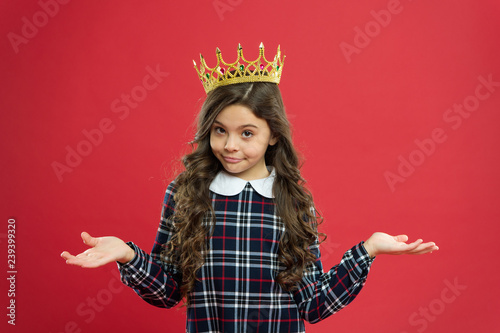 World spinning around me. Kid wear golden crown symbol princess. Every girl dreaming become princess. Lady little princess. Girl wear crown red background. Spoiled child concept. Egocentric princess