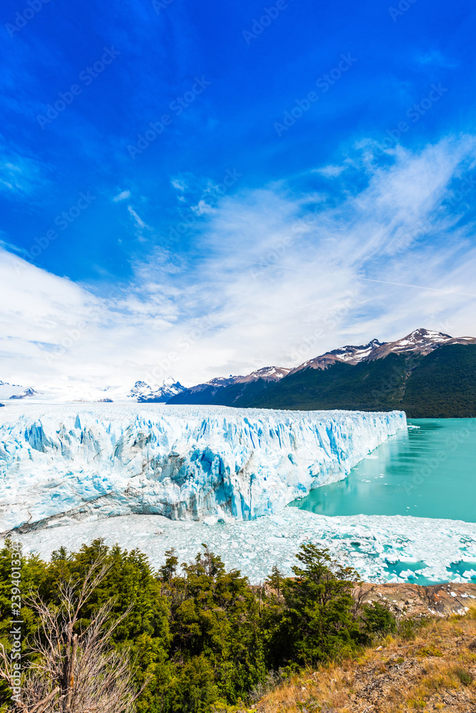 View of the Perito Moreno Glacier, Patagonia, Argentina. Vertical. Copy space for text.