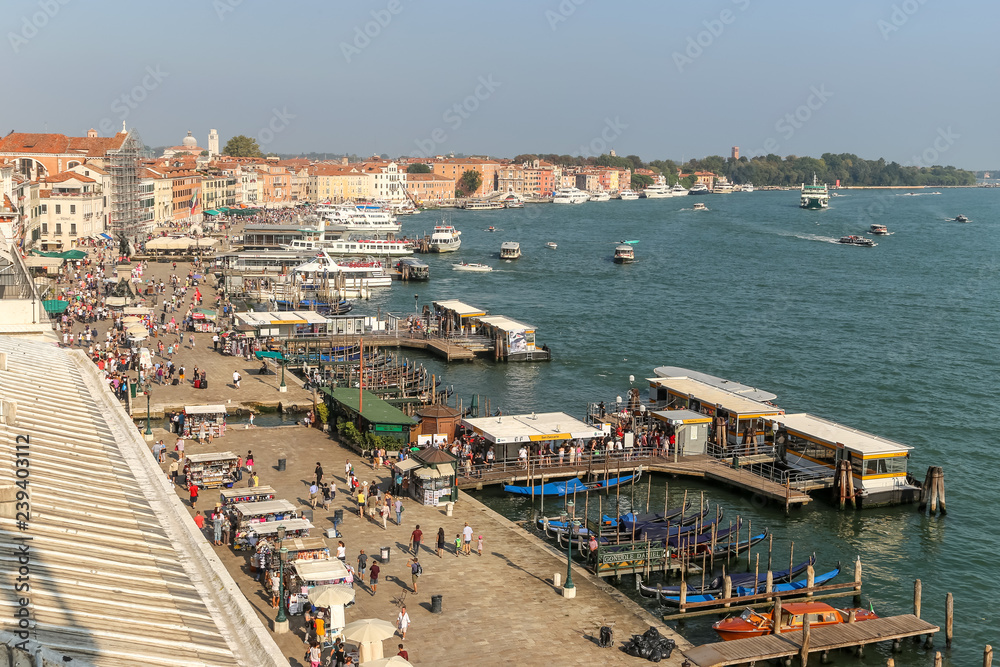 Main Colonnade in Venice with boats in port