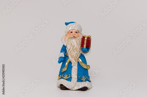 santa claus with a bag of gifts isolated on white