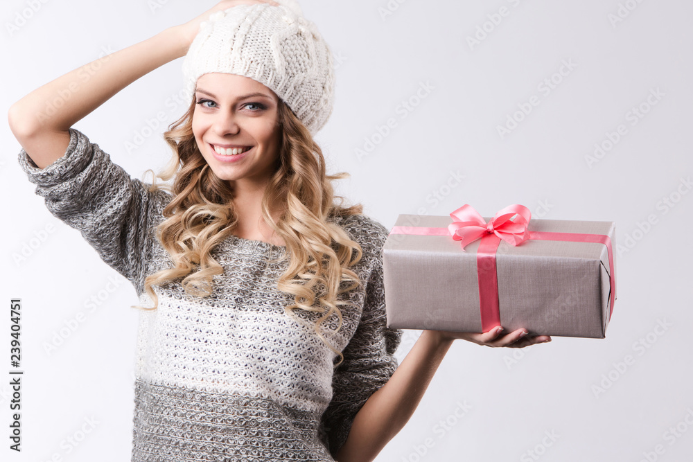 Woman with pink gift on a white. Woman with pink gift on a white.