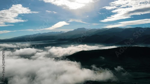 Above the clouds. Mountains and blue ski landscape photo