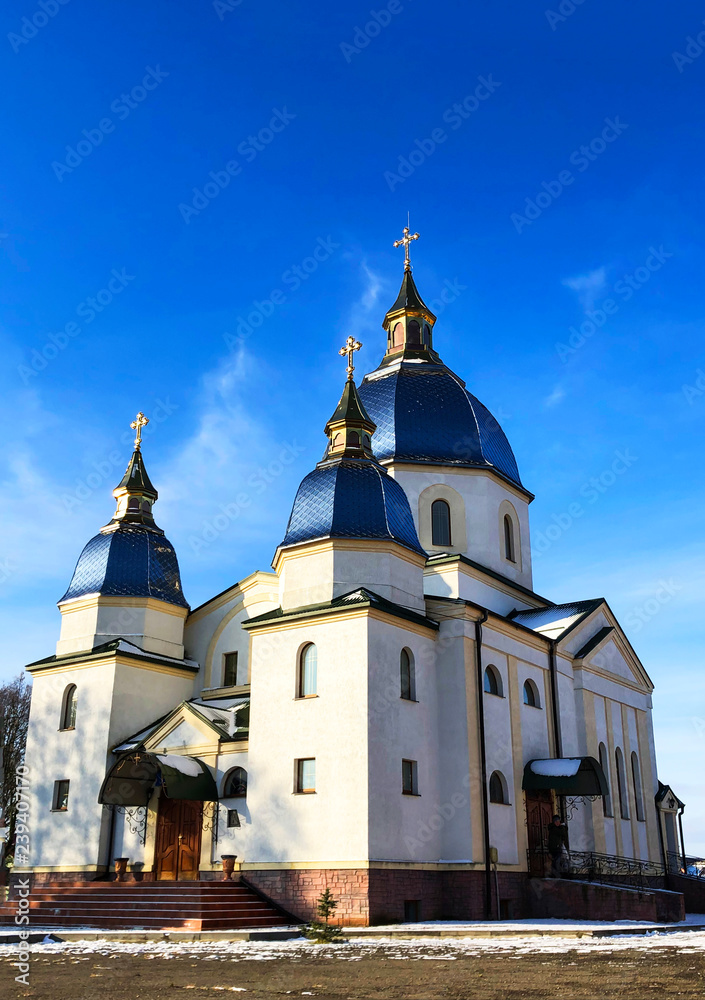 Streets and architecture of the old city of Lviv on a sunny day. Lviv Church