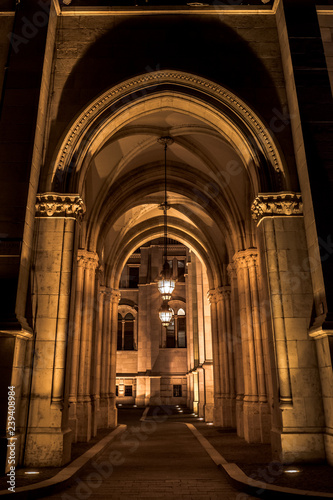 Night view of the arches of the Budapest Parliament with central lamps  Hungary