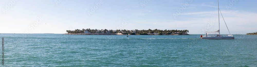Panoramic view of Sunset Key during a vibrant sunny day. Taken in Mallory Square, Key West, Florida Keys, United States.