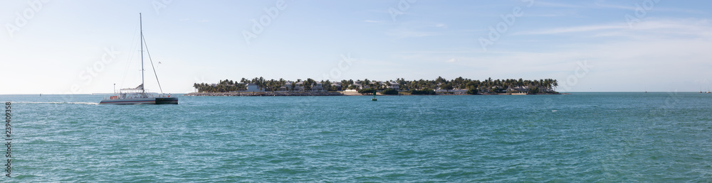 Panoramic view of Sunset Key during a vibrant sunny day. Taken in Mallory Square, Key West, Florida Keys, United States.