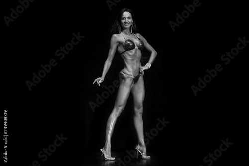 tanned muscular fitness model in bikini © zhagunov_a
